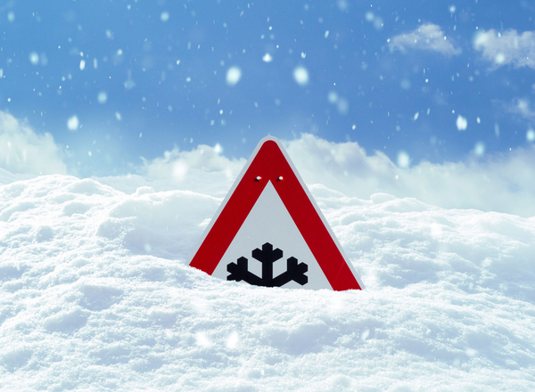 Warnschild mit Schneeflocke